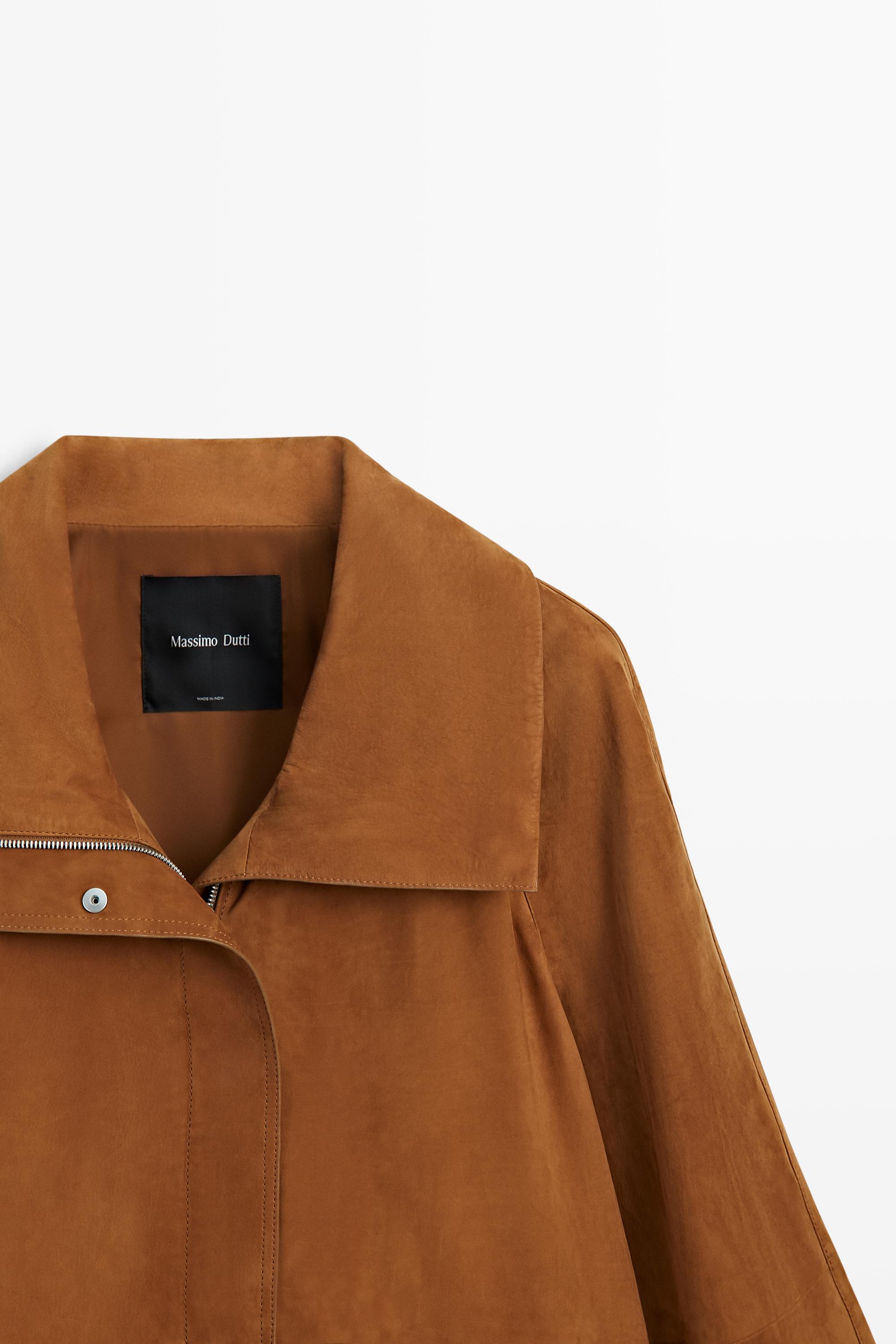 Manteau col montant en cuir nubuck